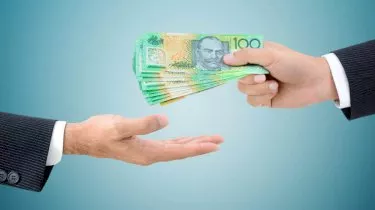 buy now pay later hands giving australian dollars cash money lender inquiry